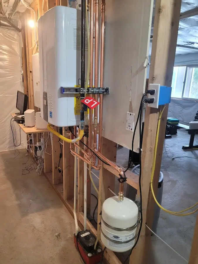 Licensed plumber repairing a kitchen sink in Georgetown